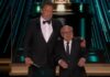 “Son of a Bitch!”: Arnold & Danny’s Batman Oscar Bit…Keaton Cameos!